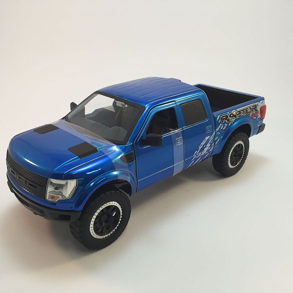 Miniatura Ford F-150 Svt Raptor 2011 Troca Rodas Azul 1/24