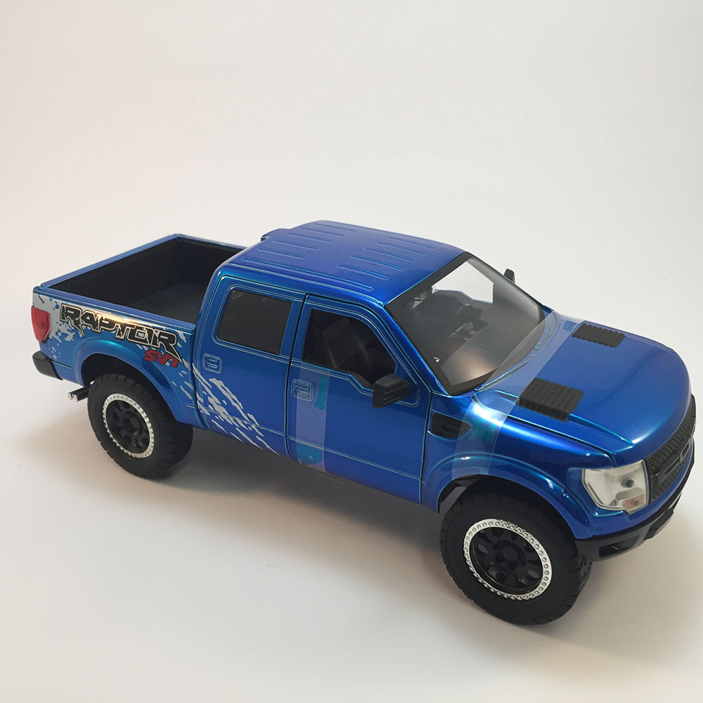 Miniatura Ford F-150 Svt Raptor 2011 Troca Rodas Azul 1/24 - Imagem 2